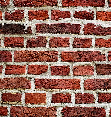 Background of Old Red Brick Wall with Cracked Concrete  closeup Outdoors Stock Photo - Budget Royalty-Free & Subscription, Code: 400-08694496