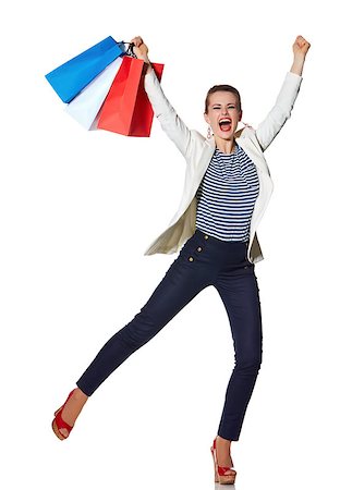 Shopping. The French way. Full length portrait of happy young woman with French flag colours shopping bags on white background rejoicing Stock Photo - Budget Royalty-Free & Subscription, Code: 400-08694630