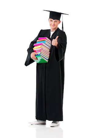 Full length portrait of a young graduation man holding books, isolated on white background Stock Photo - Budget Royalty-Free & Subscription, Code: 400-08694712