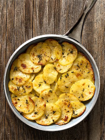 close up of rustic french golden anna potato Photographie de stock - Aubaine LD & Abonnement, Code: 400-08695730