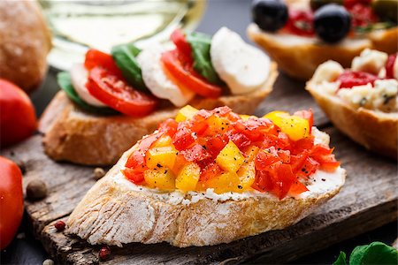 sandwich rustic table - Italian bruschetta with chopped tomatoes, herbs and oil on toasted crusty ciabatta bread Stock Photo - Budget Royalty-Free & Subscription, Code: 400-08696521
