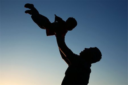 parent holding hands child silhouette - silhouette of father and son play Stock Photo - Budget Royalty-Free & Subscription, Code: 400-08696599