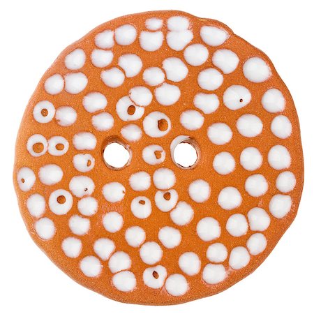 simsearch:400-06172938,k - Brown dotted handmade ceramic button isolated on white background Foto de stock - Super Valor sin royalties y Suscripción, Código: 400-08696683