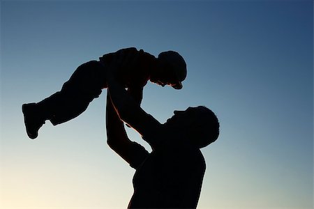 parent holding hands child silhouette - very nice silhouette of father and son Stock Photo - Budget Royalty-Free & Subscription, Code: 400-08696903