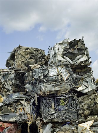 scrap yard pile of cars - Smashed Compressed Car Blocks Recycling Stock Photo - Budget Royalty-Free & Subscription, Code: 400-08693369