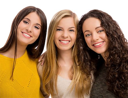 simsearch:400-06395165,k - Studio portrait of three beautiful teenage girls smiling Photographie de stock - Aubaine LD & Abonnement, Code: 400-08693501