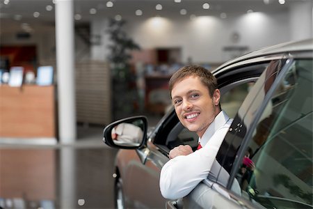 simsearch:400-08413489,k - Young smiling man in car Stock Photo - Budget Royalty-Free & Subscription, Code: 400-08693651