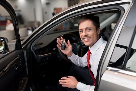 simsearch:400-08413489,k - Young man with keys of car Stock Photo - Budget Royalty-Free & Subscription, Code: 400-08693681