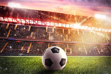 simsearch:400-09032434,k - Soccerball on the lawn of a stadium Stockbilder - Microstock & Abonnement, Bildnummer: 400-08705608