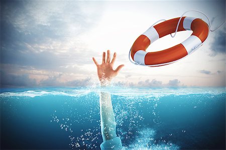 Lifesaver launched a drowning man in the sea Stock Photo - Budget Royalty-Free & Subscription, Code: 400-08705667