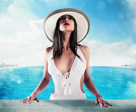 simsearch:400-08131957,k - Woman with elegant hat out of the pool Stockbilder - Microstock & Abonnement, Bildnummer: 400-08705681
