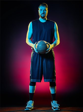 sports basketball portrait black background - one basketball player man Isolated on black background Stock Photo - Budget Royalty-Free & Subscription, Code: 400-08705796