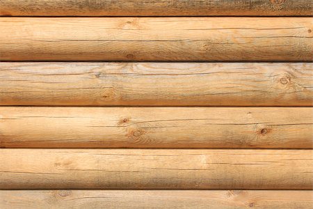 Horizontal parallel large new wooden logs in sunlight, close-up and detailed Stock Photo - Budget Royalty-Free & Subscription, Code: 400-08705845