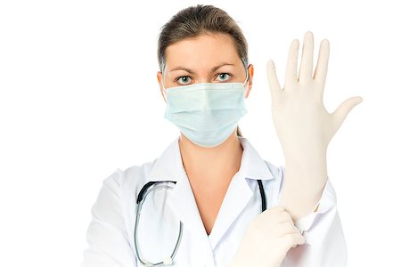 woman surgeon preparing for surgery put on gloves Stock Photo - Budget Royalty-Free & Subscription, Code: 400-08705972