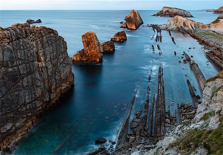 simsearch:400-08887977,k - Atlantic ocean rocky coastline near Portio Beach (Pielagos, Cantabria, Spain) evening view. Foto de stock - Super Valor sin royalties y Suscripción, Código: 400-08706118