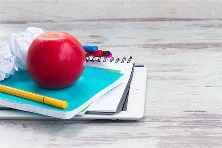 simsearch:400-07046956,k - Apple with school supplies on white aged wooden table Stock Photo - Budget Royalty-Free & Subscription, Code: 400-08706734