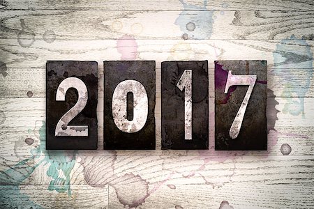 simsearch:400-08709089,k - The word "2017" written in vintage dirty metal letterpress type on a whitewashed wooden background with ink and paint stains. Stock Photo - Budget Royalty-Free & Subscription, Code: 400-08707689