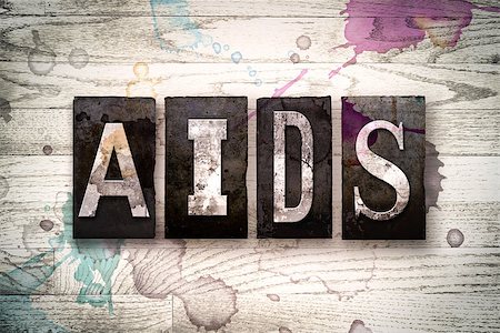 simsearch:400-08407055,k - The word "AIDS" written in vintage dirty metal letterpress type on a whitewashed wooden background with ink and paint stains. Foto de stock - Super Valor sin royalties y Suscripción, Código: 400-08707694