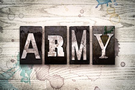 simsearch:400-08709089,k - The word "ARMY" written in vintage dirty metal letterpress type on a whitewashed wooden background with ink and paint stains. Foto de stock - Royalty-Free Super Valor e Assinatura, Número: 400-08707695