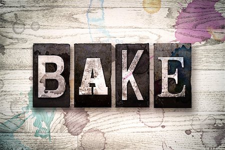 simsearch:400-08709089,k - The word "BAKE" written in vintage dirty metal letterpress type on a whitewashed wooden background with ink and paint stains. Stock Photo - Budget Royalty-Free & Subscription, Code: 400-08707698
