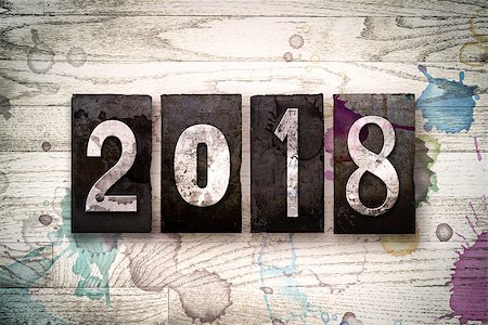 simsearch:400-08709089,k - The word "2018" written in vintage dirty metal letterpress type on a whitewashed wooden background with ink and paint stains. Stock Photo - Budget Royalty-Free & Subscription, Code: 400-08707690