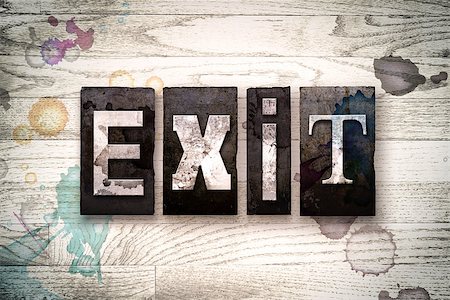 simsearch:400-08709089,k - The word "EXIT" written in vintage dirty metal letterpress type on a whitewashed wooden background with ink and paint stains. Stock Photo - Budget Royalty-Free & Subscription, Code: 400-08707722
