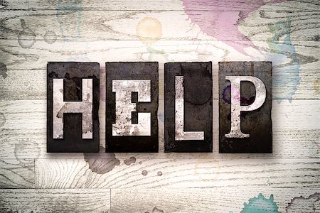 simsearch:400-08709089,k - The word "HELP" written in vintage dirty metal letterpress type on a whitewashed wooden background with ink and paint stains. Foto de stock - Royalty-Free Super Valor e Assinatura, Número: 400-08707941
