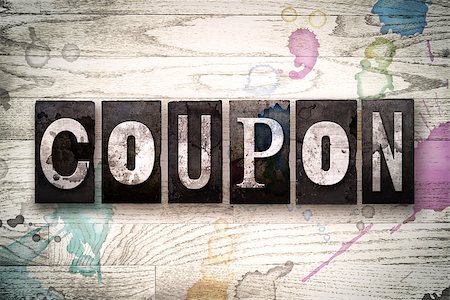 simsearch:400-08709089,k - The word "COUPON" written in vintage, dirty metal letterpress type on a whitewashed wooden background with ink and paint stains. Foto de stock - Royalty-Free Super Valor e Assinatura, Número: 400-08709094
