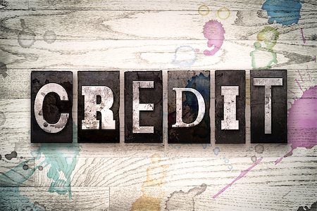 simsearch:400-08709089,k - The word "CREDIT" written in vintage, dirty metal letterpress type on a whitewashed wooden background with ink and paint stains. Stock Photo - Budget Royalty-Free & Subscription, Code: 400-08709095