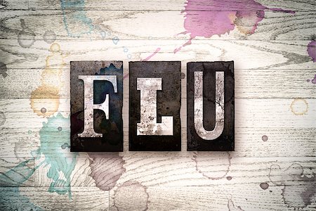 simsearch:400-08709089,k - The word "FLU" written in vintage, dirty metal letterpress type on a whitewashed wooden background with ink and paint stains. Foto de stock - Royalty-Free Super Valor e Assinatura, Número: 400-08709106