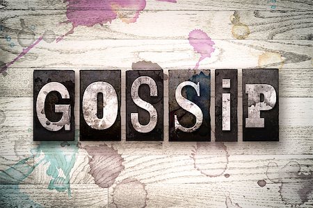 simsearch:400-08709089,k - The word "GOSSIP" written in vintage, dirty metal letterpress type on a whitewashed wooden background with ink and paint stains. Foto de stock - Royalty-Free Super Valor e Assinatura, Número: 400-08709118