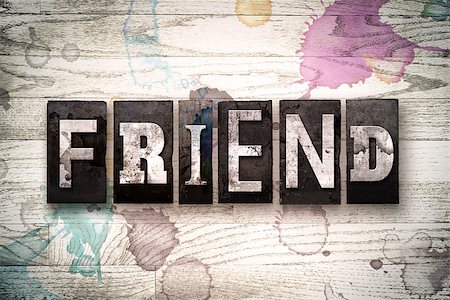 simsearch:400-08709089,k - The word "FRIEND" written in vintage, dirty metal letterpress type on a whitewashed wooden background with ink and paint stains. Foto de stock - Royalty-Free Super Valor e Assinatura, Número: 400-08709110