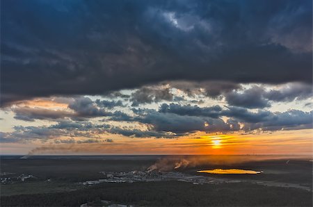 Vinzili, Russia - June 12, 2015: Bird eye view onto industrial area at sunset. Tyumen region Stock Photo - Budget Royalty-Free & Subscription, Code: 400-08710367