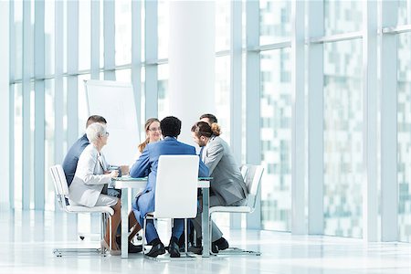 Business people at a meeting in office Stock Photo - Budget Royalty-Free & Subscription, Code: 400-08729785
