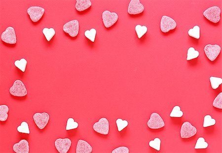 Festive red background and sweet sugar hearts, valentines day Stock Photo - Budget Royalty-Free & Subscription, Code: 400-08734008