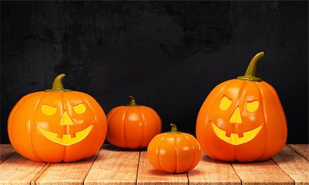 simsearch:400-07172678,k - Halloween pumpkin on wooden table on dark background. 3d rendering Photographie de stock - Aubaine LD & Abonnement, Code: 400-08734146
