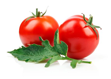 Red tomatoes with green leaf, isolated on white background Foto de stock - Super Valor sin royalties y Suscripción, Código: 400-08734162