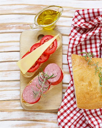 simsearch:400-04376706,k - traditional Italian ciabatta bread with cheese, sausage, tomatoes and olive oil Stock Photo - Budget Royalty-Free & Subscription, Code: 400-08734423