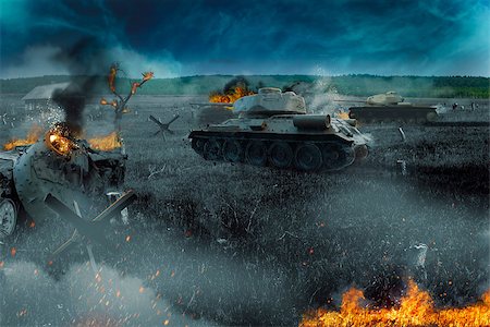 simsearch:400-08791766,k - Tank battle in the burned-out field. The attack near the village Stock Photo - Budget Royalty-Free & Subscription, Code: 400-08734692