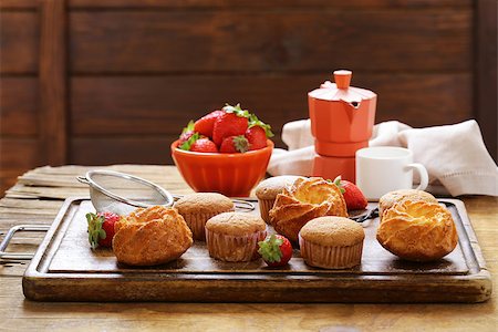 simsearch:400-07034479,k - homemade pastries, sweet muffins with powdered sugar Stock Photo - Budget Royalty-Free & Subscription, Code: 400-08735488
