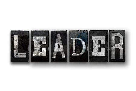The word "LEADER" written in vintage, dirty, ink stained letterpress type and isolated on a white background. Stock Photo - Budget Royalty-Free & Subscription, Code: 400-08735614