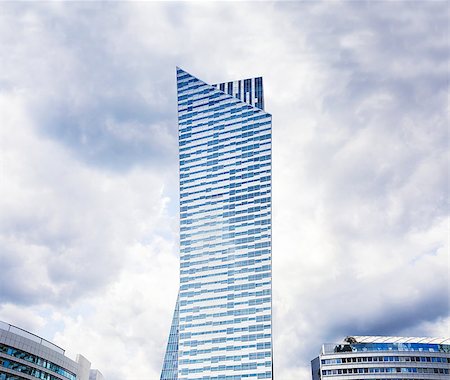 Modern residential skyscraper at cloudy sky. Copy space. Stock Photo - Budget Royalty-Free & Subscription, Code: 400-08735884