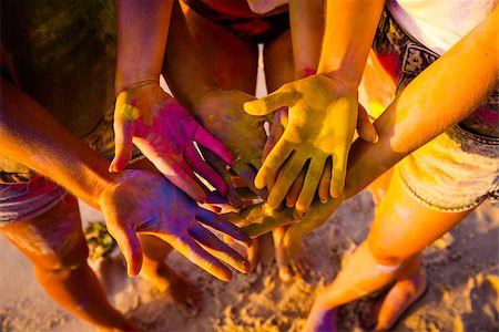 powdered paint pigment - Teenagers playing with colored powder and showing her hands Stock Photo - Budget Royalty-Free & Subscription, Code: 400-08736504