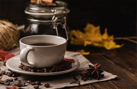 Cup of coffee with ingredients, spices and some kitchenware at autumn evening. Stock Photo - Budget Royalty-Free & Subscription, Code: 400-08737128