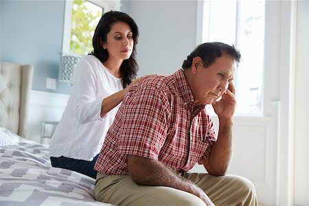 Adult Daughter Comforting Father Suffering With Dementia Stock Photo - Budget Royalty-Free & Subscription, Code: 400-08737205