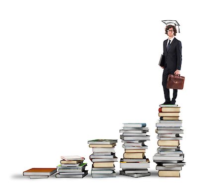 Scale with books and man with graduation hat Stock Photo - Budget Royalty-Free & Subscription, Code: 400-08730024