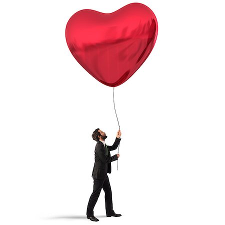 Man holds a big red heart balloon Photographie de stock - Aubaine LD & Abonnement, Code: 400-08730029