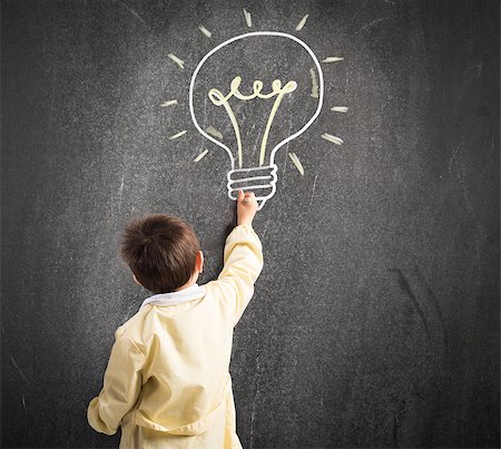 simsearch:400-05329645,k - Child draws with chalk on the blackboard a light bulb Stock Photo - Budget Royalty-Free & Subscription, Code: 400-08730112