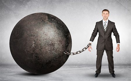 simsearch:400-06477542,k - Businessman chained to large ball on grey background Stockbilder - Microstock & Abonnement, Bildnummer: 400-08730155