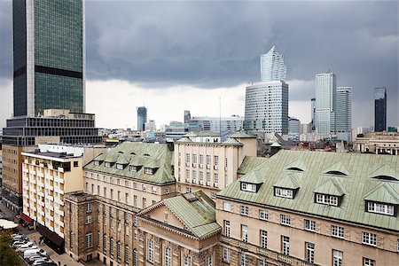 simsearch:400-08730397,k - Old residences and modern office buildings at Warsaw city center. Cloudy Day. Photographie de stock - Aubaine LD & Abonnement, Code: 400-08730399